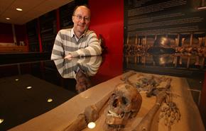 Kurt Hunter-Mann and one of the skeletons at Gladiators: A Cemetery of Secrets