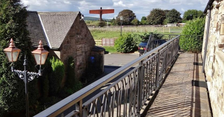 Angel View Hotel and Restaurant exterior. Angel of the North in the distance.