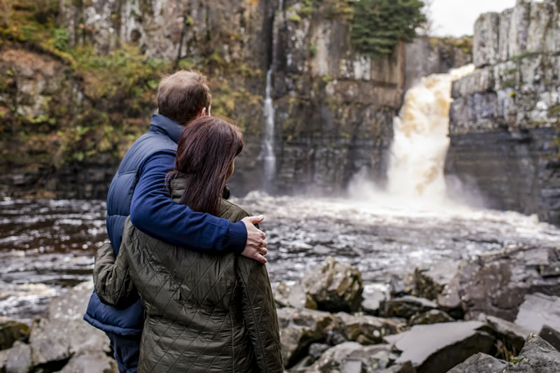 Couple looking at High Force Waterfall