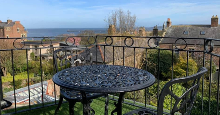 Tynemouth 61 Guesthouse and Tea room period balcony with view of the sea and Collingwood Monument