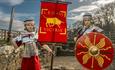 Two children dressed as Roman soldiers in their armour at Binchester Roman Fort.