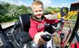 Children playing on diggers at Diggerland Durham
