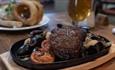 Steak and tomatoes at Thomas Wright House Restaurant