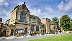 Image of Palace Green Library's exterior on a sunny day.