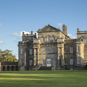 Exterior view of Seaton Delaval Hall on a sunny day. 