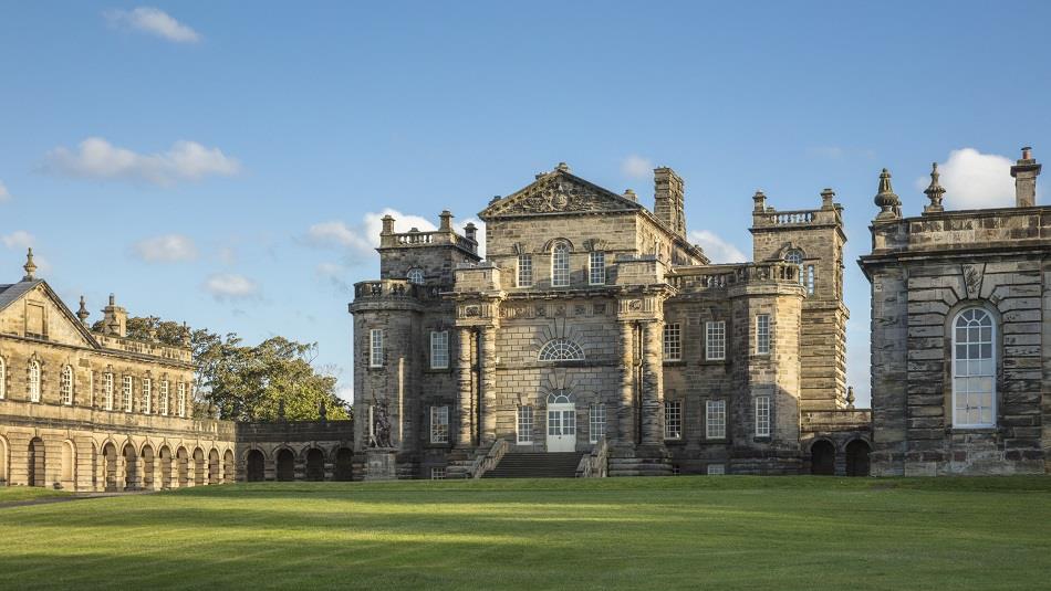 Exterior view of Seaton Delaval Hall on a sunny day.