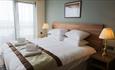 Image of a light, fresh bedroom at The Commissioners Quay Inn.