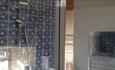 Image of bathroom with blue patterned tiles at Cragend Farm B&B